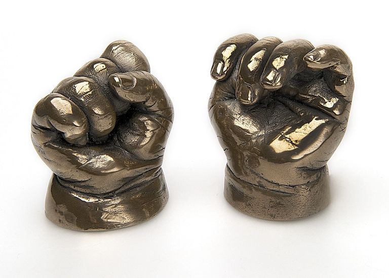 Polished bronze baby hands, loosely clenched fists