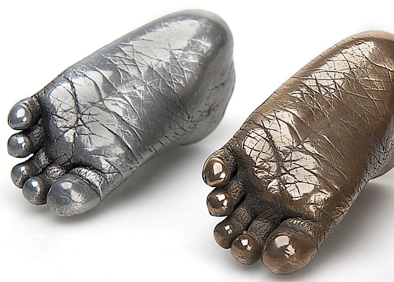 Aluminium and bronze cold casts showing the fine detail of the sole of the foot