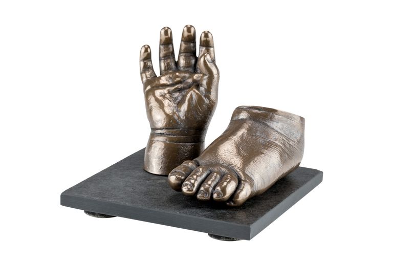 Bronze cold cast hand and foot on slate base