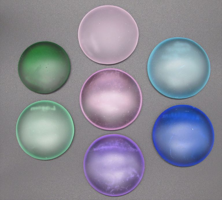 Seven circles of glass to show a sample of colours available 