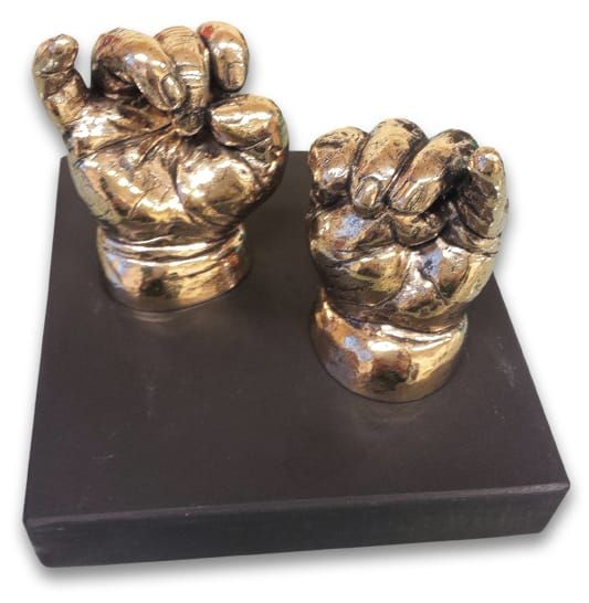 Highly polished real bronze pair of closed baby hands