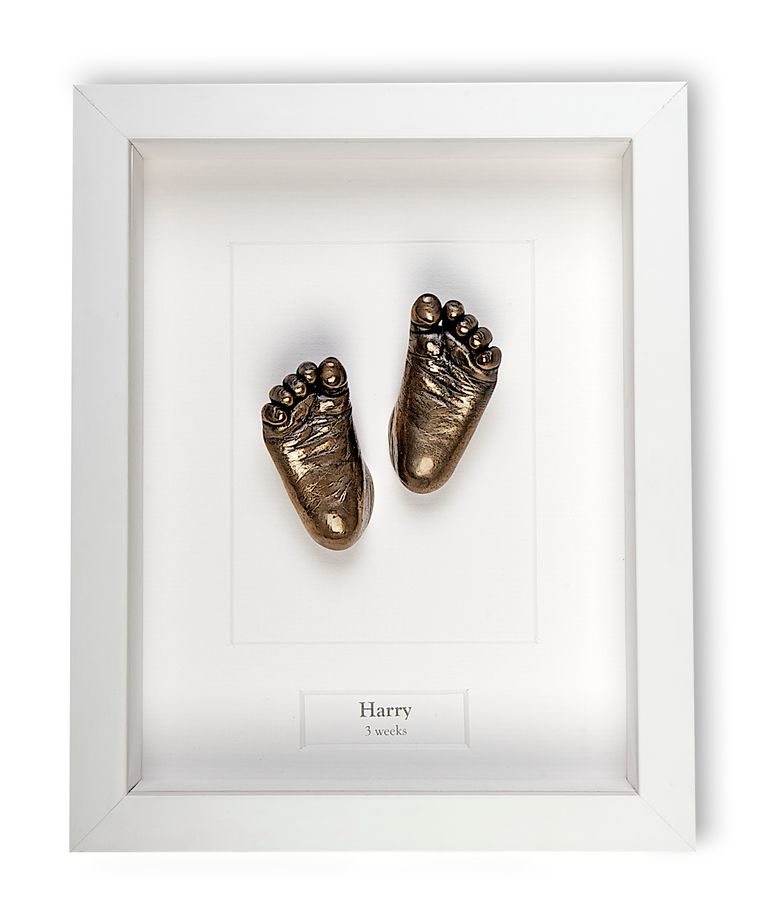 Bronze cold cast baby feet in a smooth white box frame